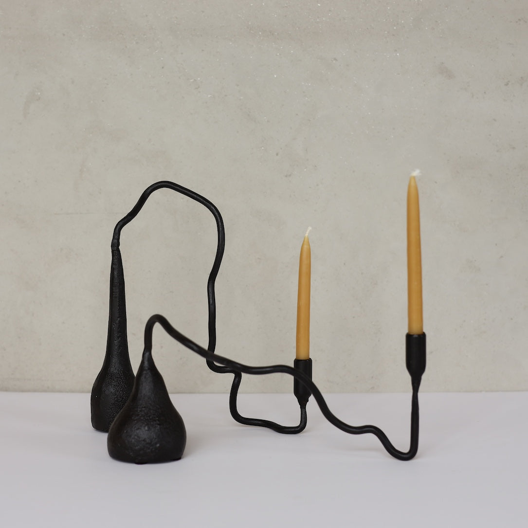 BENT IRON CANDLESTICK