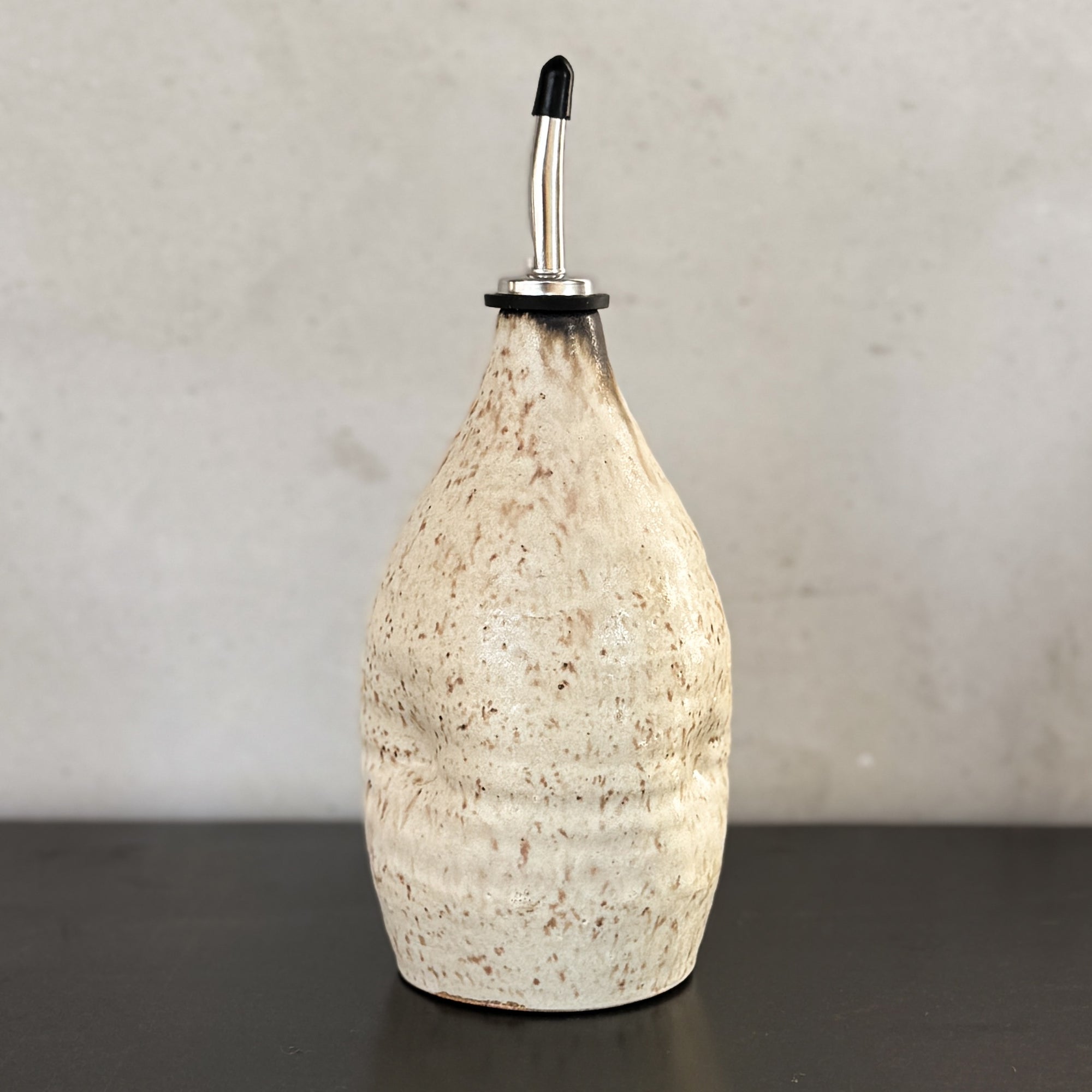 HAND THROWN OIL CRUET