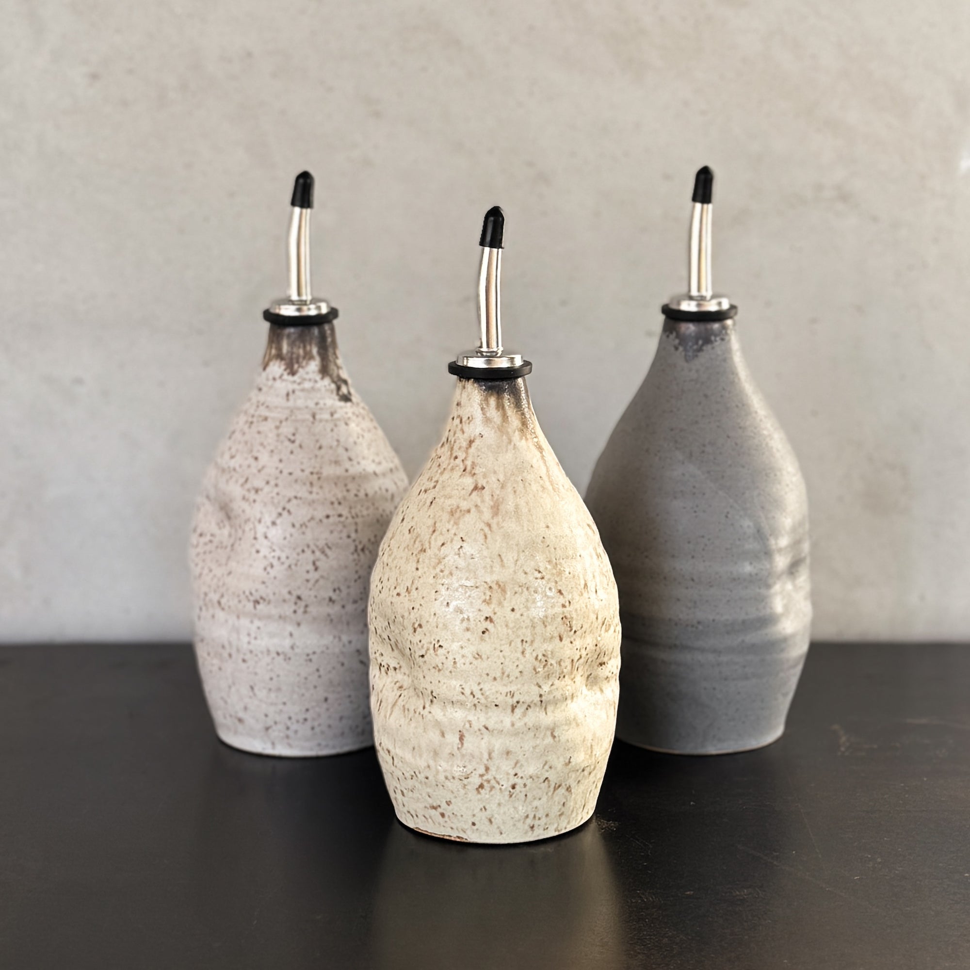 HAND THROWN OIL CRUET