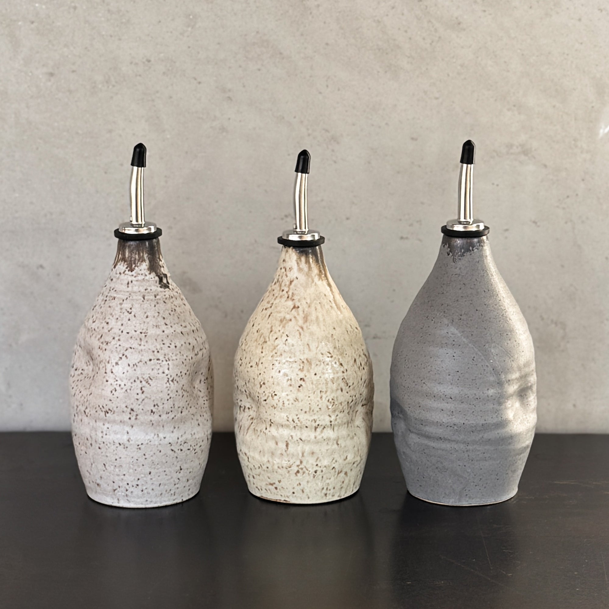 HAND THROWN OIL CRUET