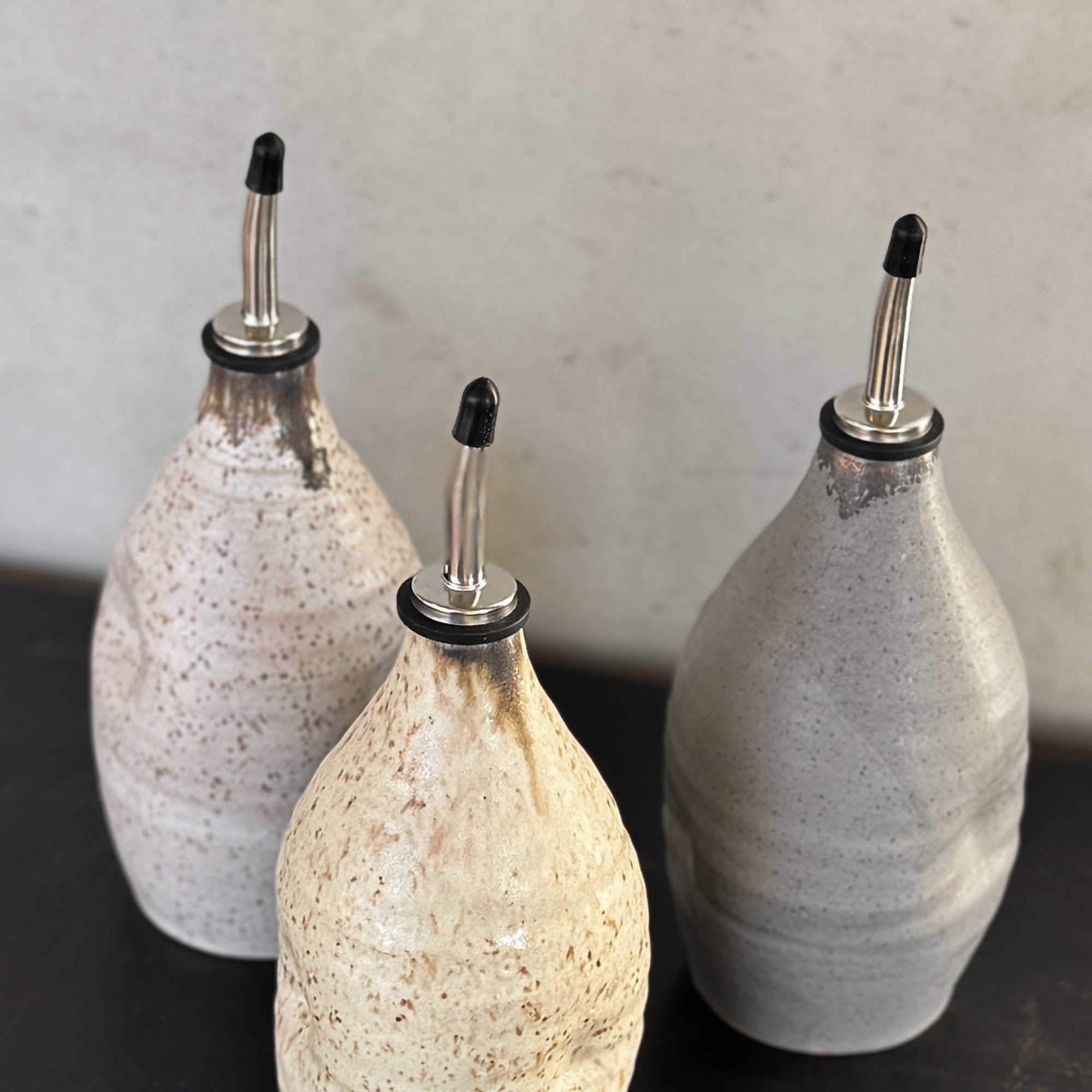 HAND THROWN OIL CRUET