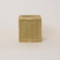 Bar of soap with 'Savon de Marseille' text on a light background