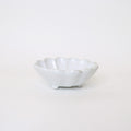 White ceramic bowl on a white background