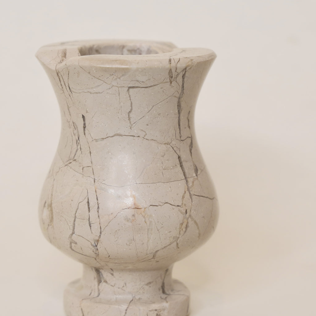 Marbled vase on a plain background