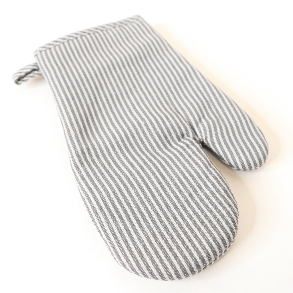 Gray striped oven mitt on a white background