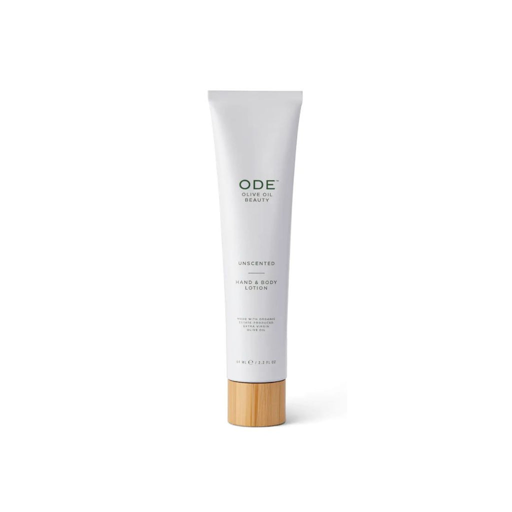 Tube of ODE unscented hand and body lotion on a white background