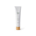 Tube of ODE unscented hand and body lotion on a white background